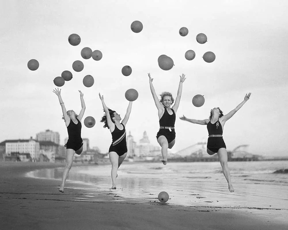 Balloon Dancers on Long Beach by Bettmann, fine art print, The Picturalist