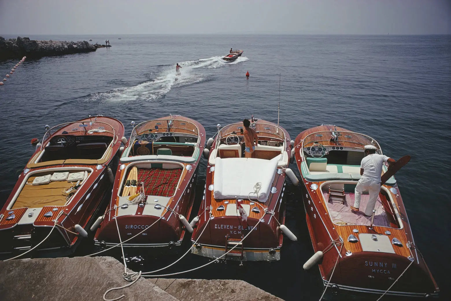 Riva Boats at Hôtel du Cap-Eden-Roc by Slim Aarons, metal print, The Picturalist