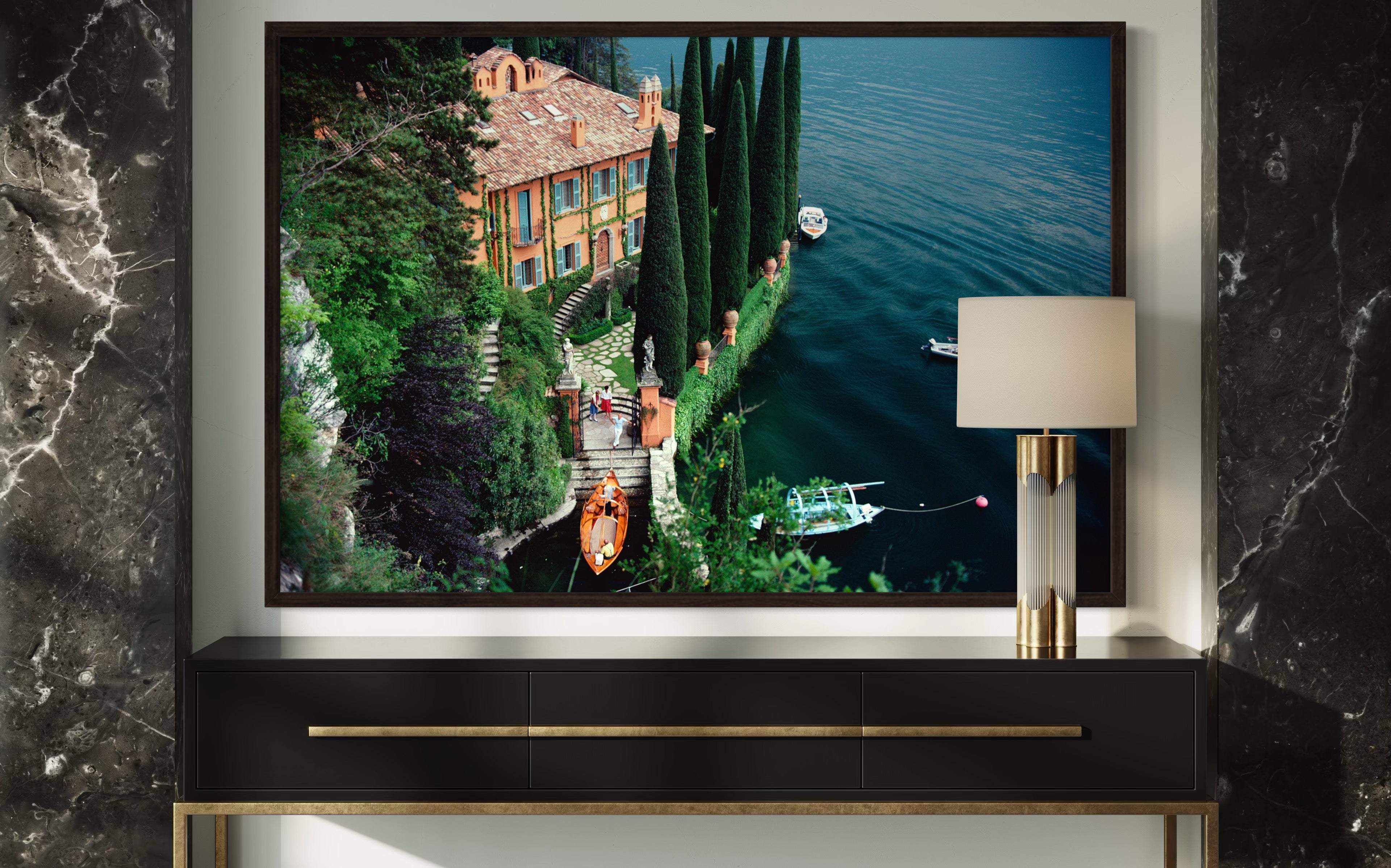 Slim Aarons’ Giacomo Montegazza featured in a modern hallway gallery wall, perfect for real estate staging art and curated art collections for high-end properties.