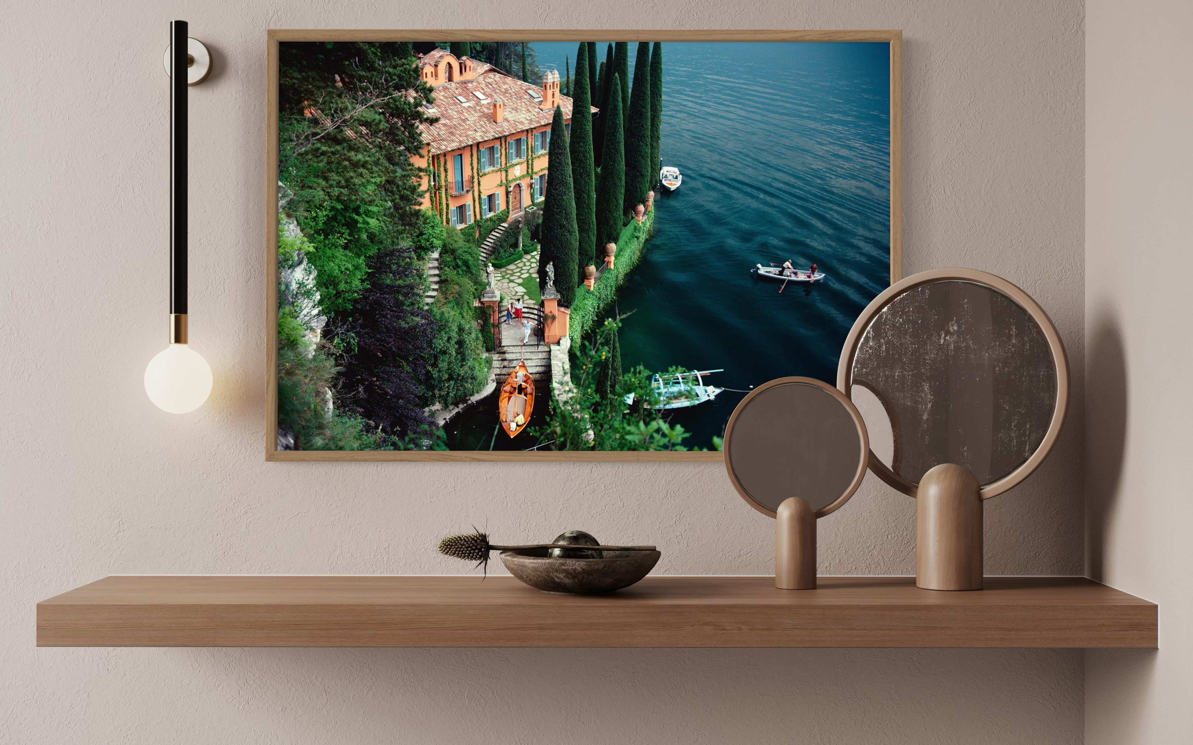Slim Aarons’ Giacomo Montegazza featured in a modern hallway gallery wall, perfect for real estate staging art and curated art collections for high-end properties.