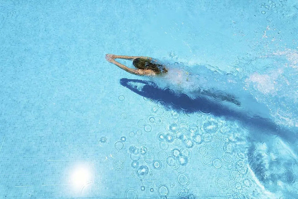 Woman Diving in Swimming Pool by Estend61, fine art print, The Picturalist