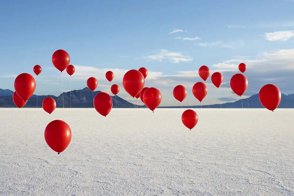 Red Balloons on Salt Flats by Andy Ryan, fine art print, The Picturalist