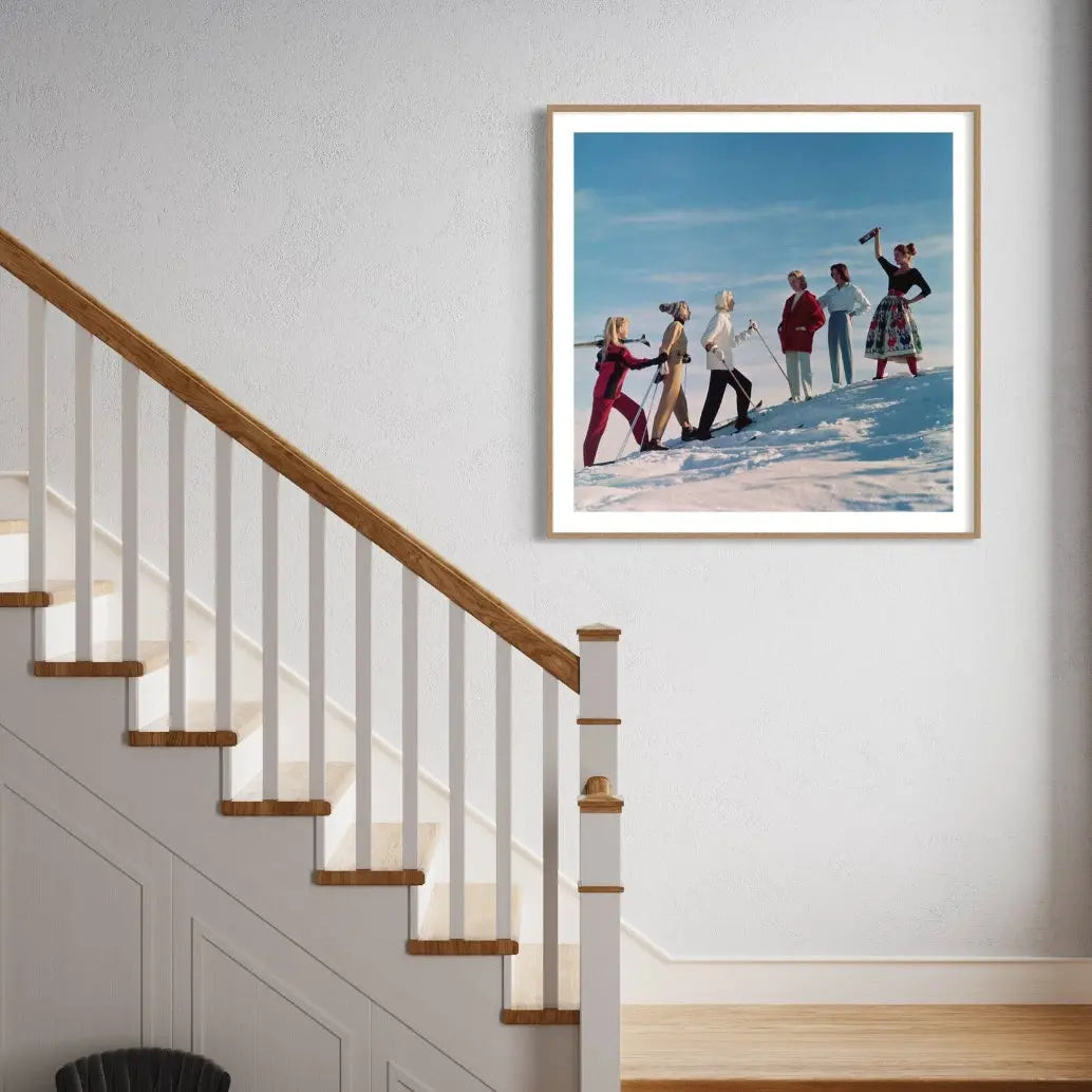 Skiing Party by Chaloner Woods showcased in a designer room setting