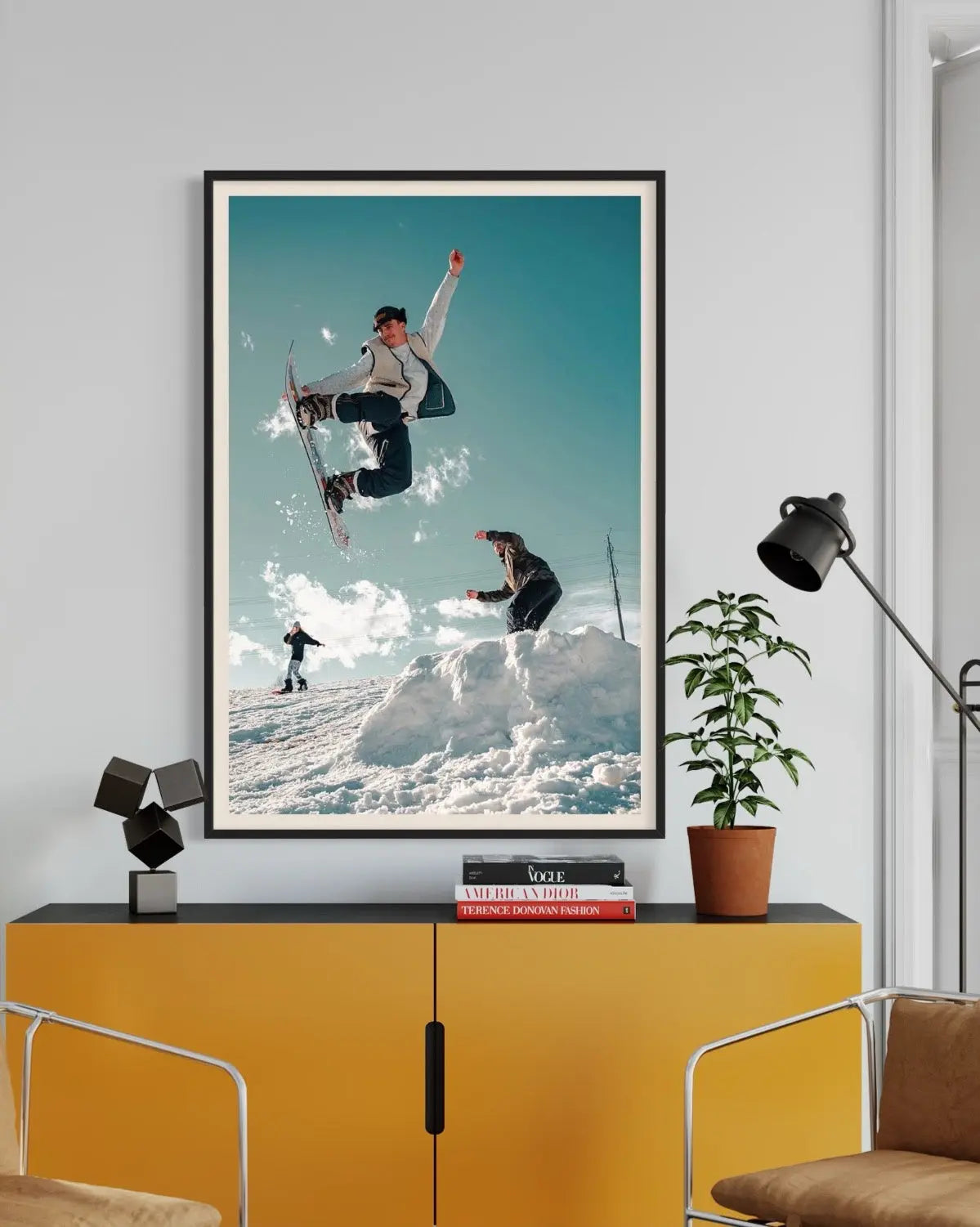 Snowboarders by C. Lloyd showcased in a designer room setting