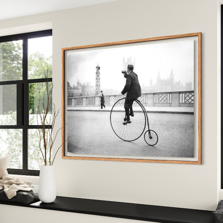 Penny Farthing Bugle by Fox Photos shown above a modern bedroom setting, vintage fine-art photography curated by The Picturalist.