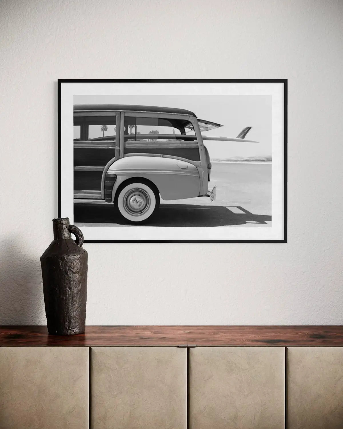 Old Woodie Station Wagon with Surfboard by Skodonnell displayed in a modern living room interior