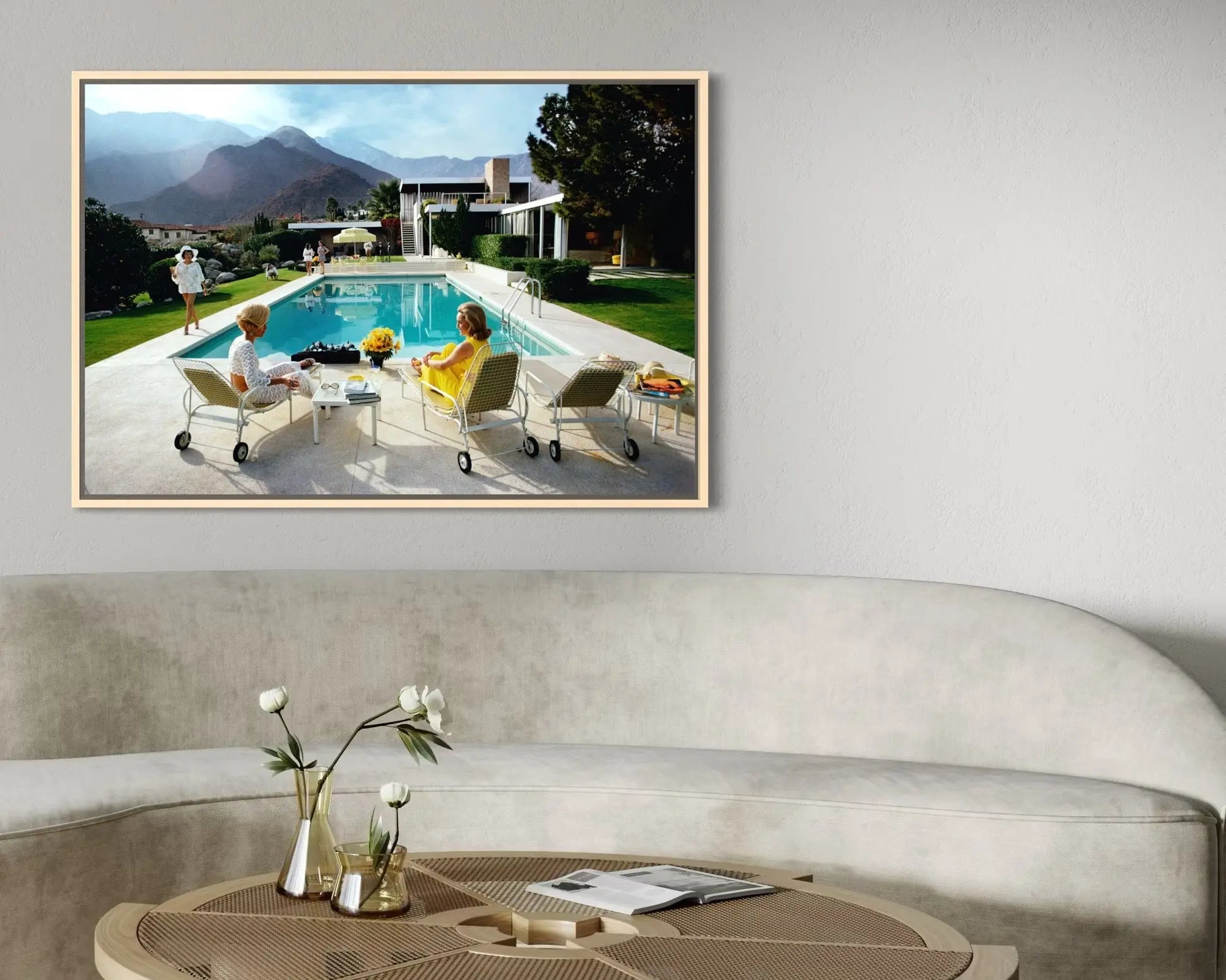 Poolside Gossip by Slim Aarons displayed in a modern living room interior