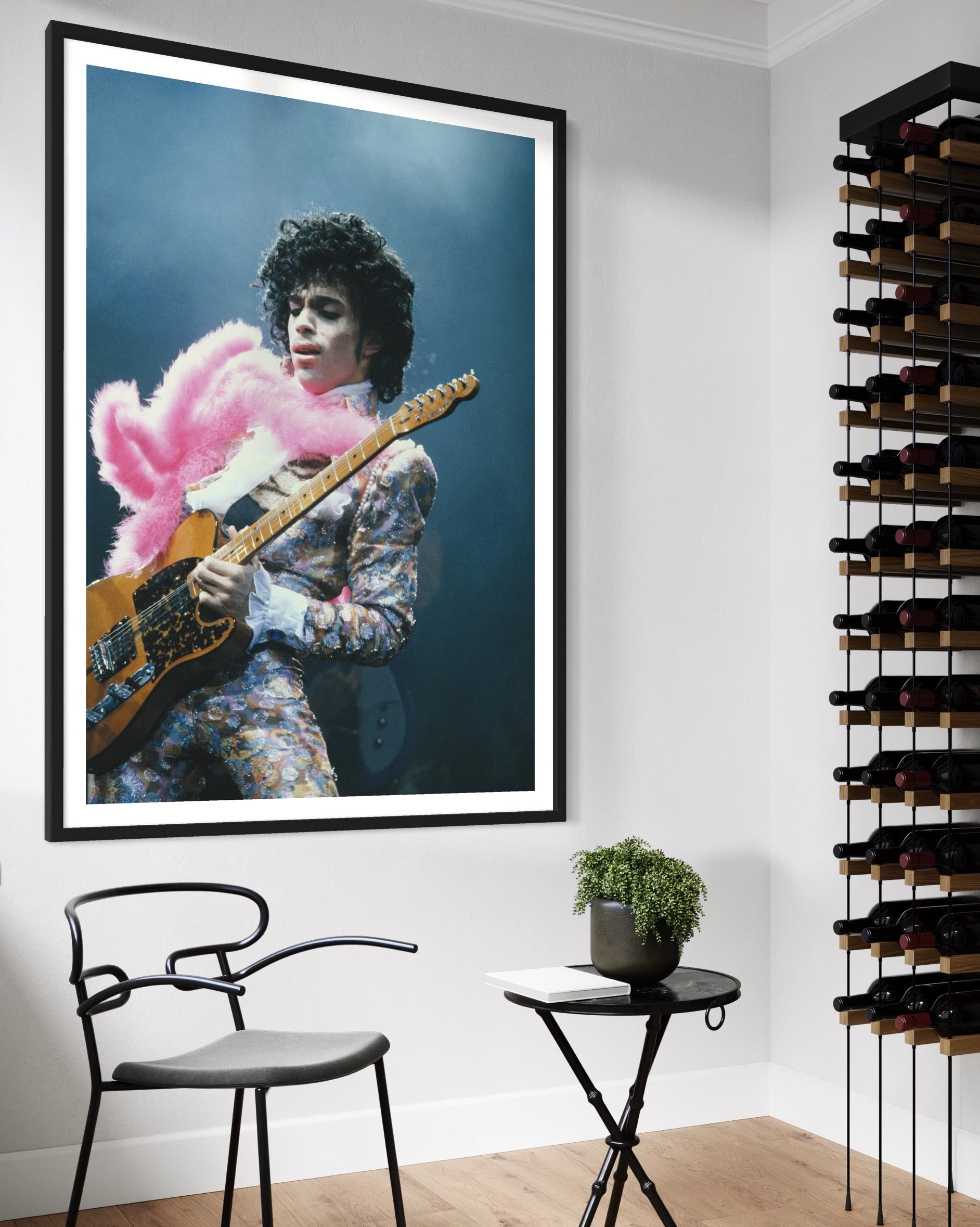 Prince Live at The Forum by Michael Ochs Archives, vibrant concert photograph of Prince performing in pink feathers and sequins, fine art print framed by The Picturalist