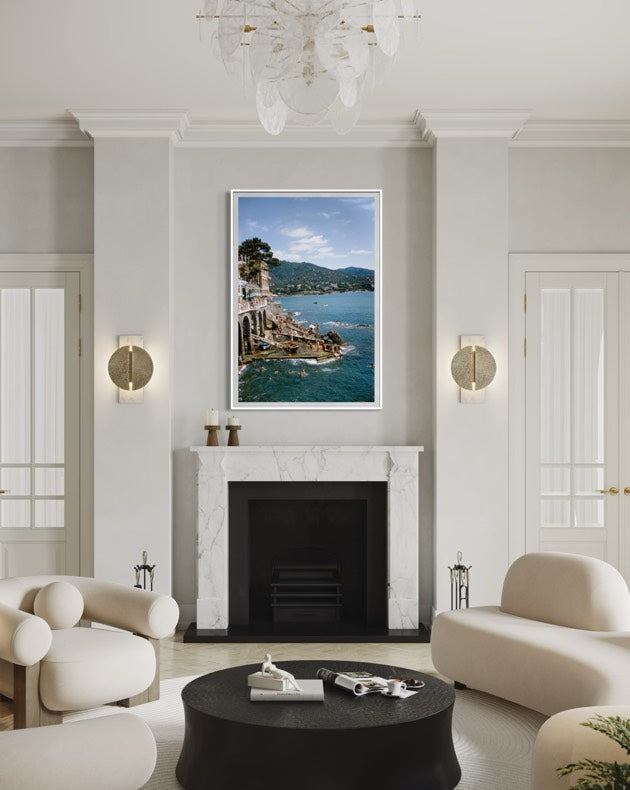 Rapallo, Italy by Slim Aarons displayed in a sophisticated coastal living room, bringing Italian Riviera elegance and designer-grade wall decor to luxury interiors.
