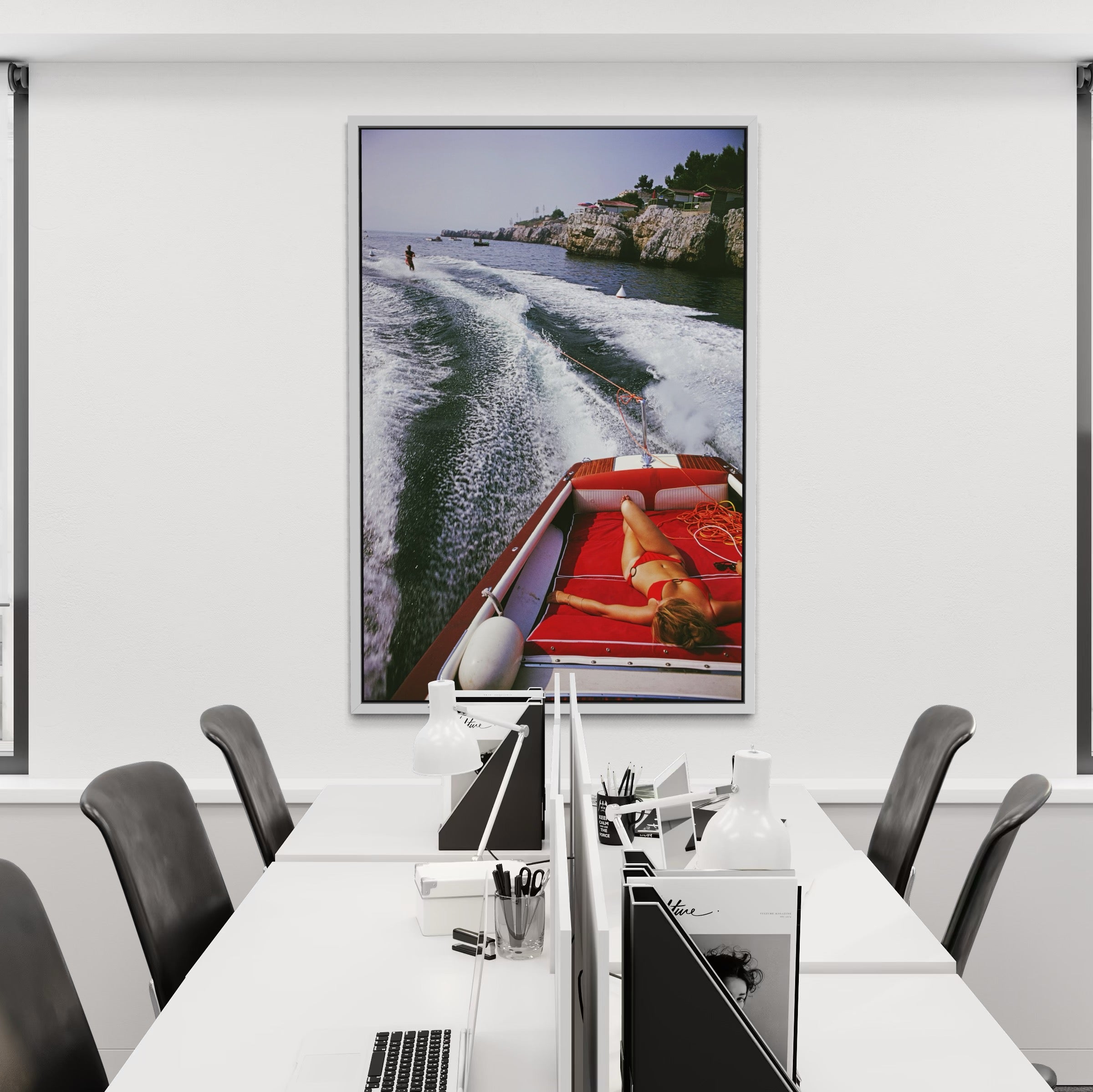 Leisure in Antibes by Slim Aarons displayed in a modern office interior, Chromaluxe metal print curated for corporate and commercial spaces by The Picturalist.