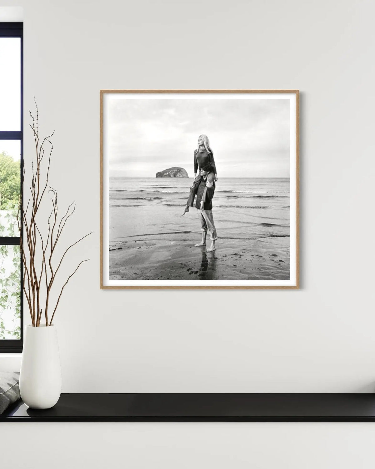 Brigitte Bardot by Jim Gray displayed in a modern living room interior