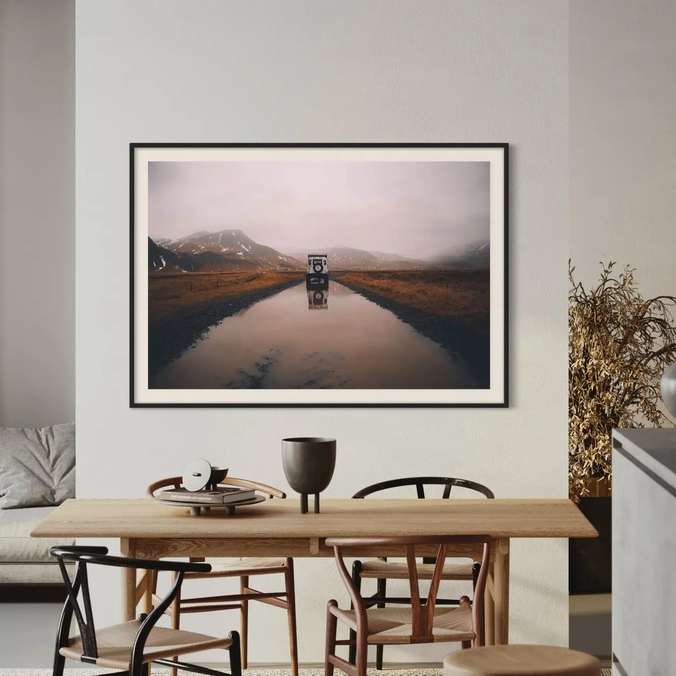 Landed by V. Morris displayed in a modern living room interior
