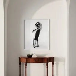 Audrey Hepburn in Givenchy showcased in a designer room setting
