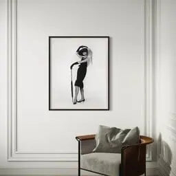 Audrey Hepburn in Givenchy shown in a minimalist home decor setting
