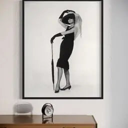 Audrey Hepburn in Givenchy featured in an elegant interior space