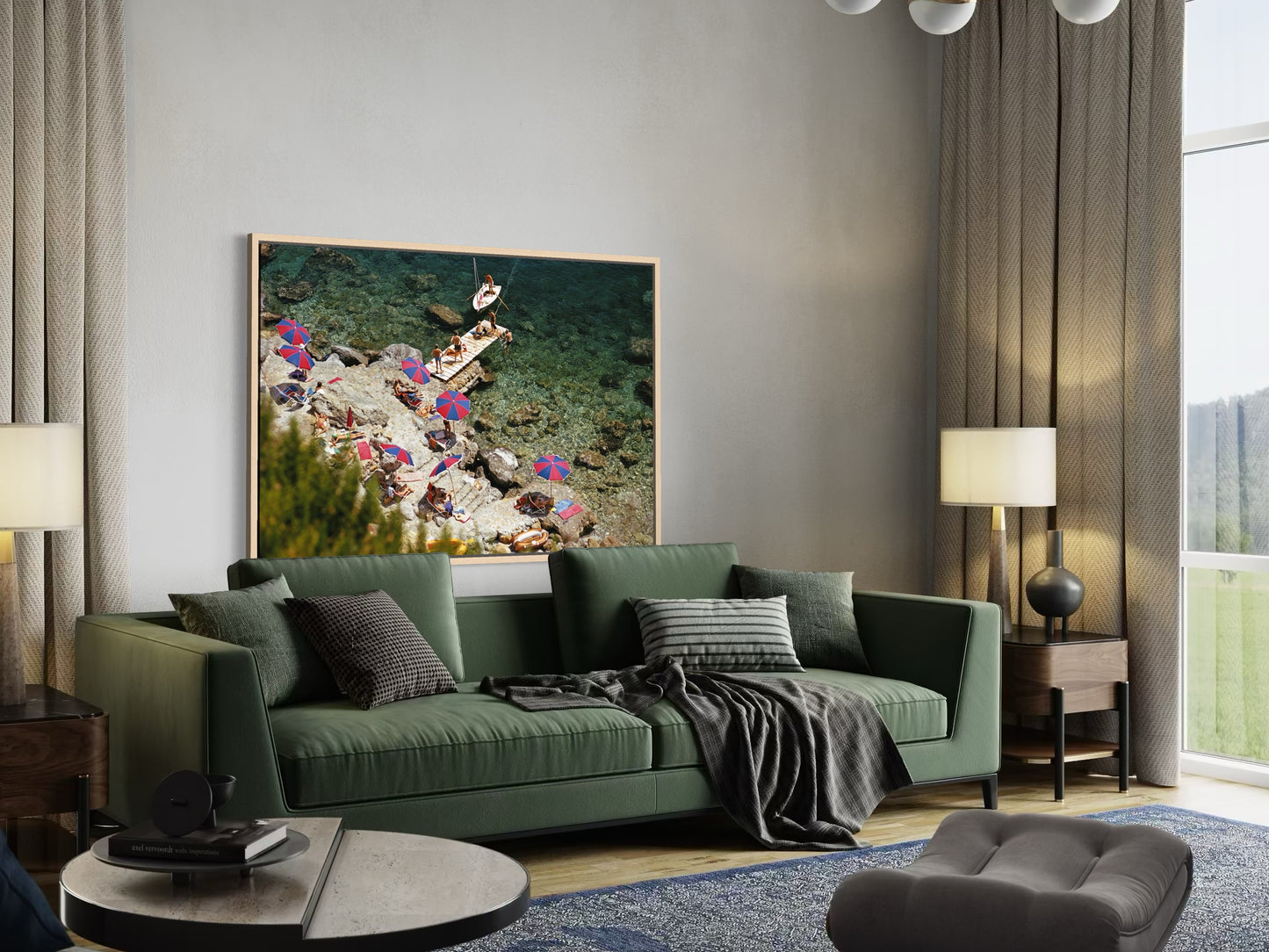 Modern living room with a green sofa, decorative pillows, and a large framed picture on the wall.
