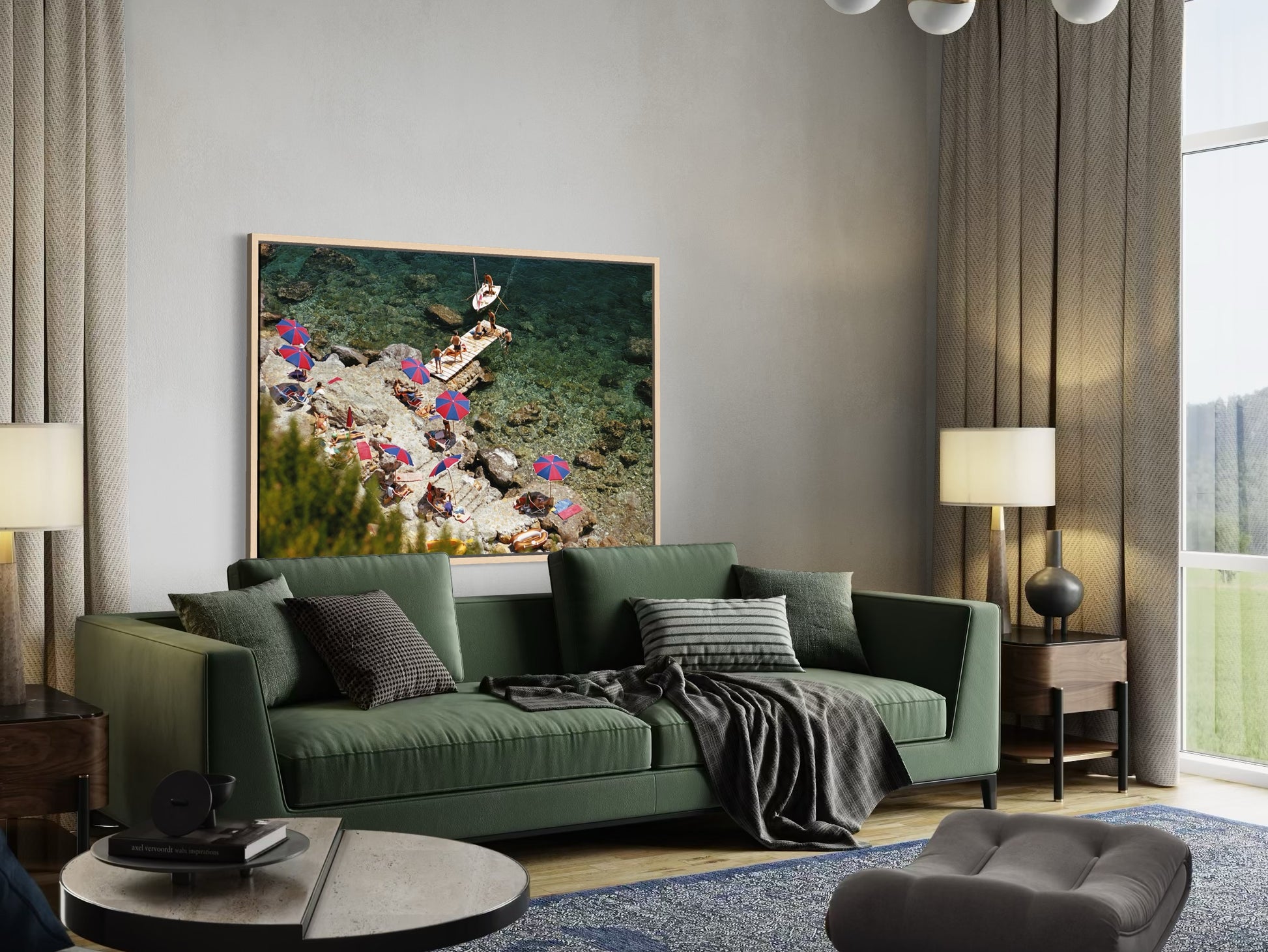 Modern living room with a green sofa, decorative pillows, and a large framed picture on the wall.