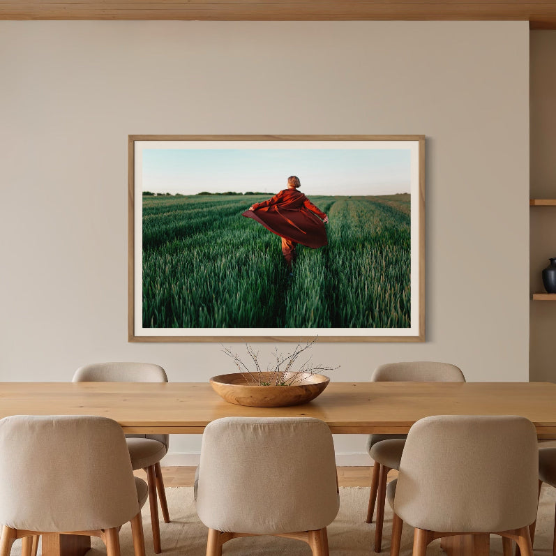 Walking at Sunset by Igor Ustynskyy in a refined dining space, elevating high-end interiors with bespoke art prints and The Picturalist custom framing.