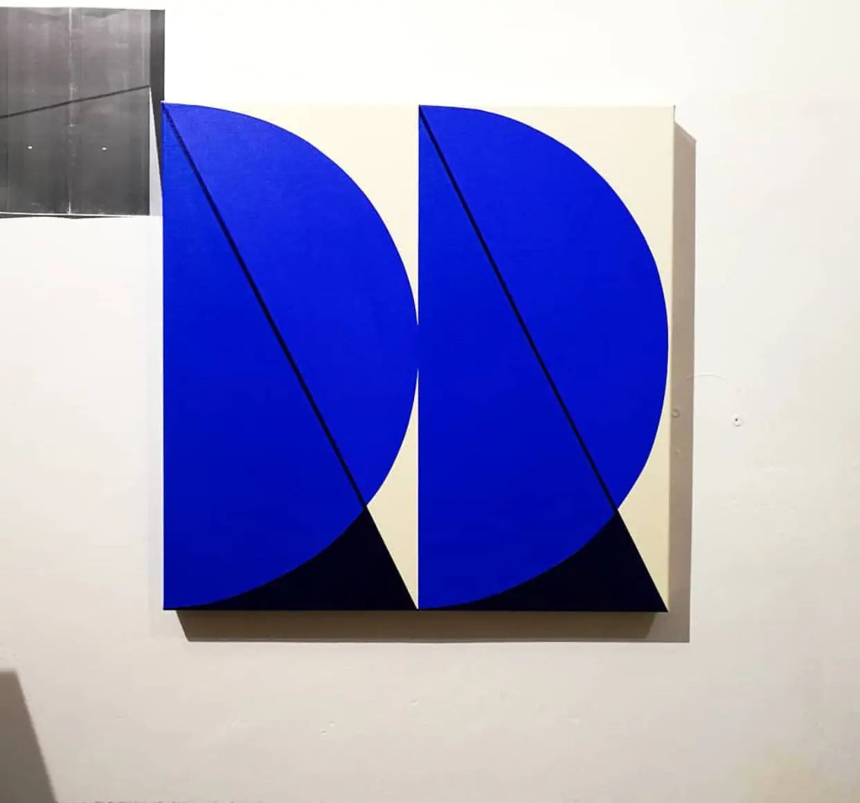 Cuadratura #03 by Rodrigo Martin displayed in a modern living room interior