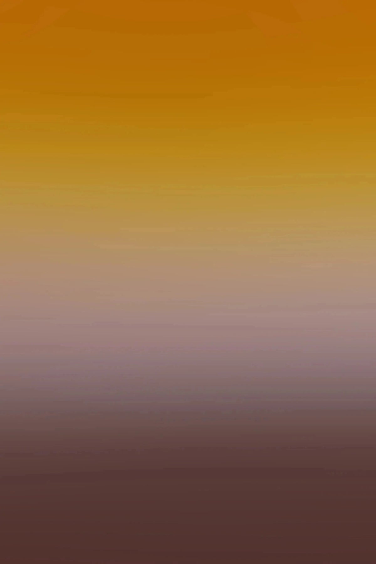 A smooth vertical gradient transitioning from a warm golden yellow at the top, through soft beige in the middle, to a deep muted plum-brown at the bottom.