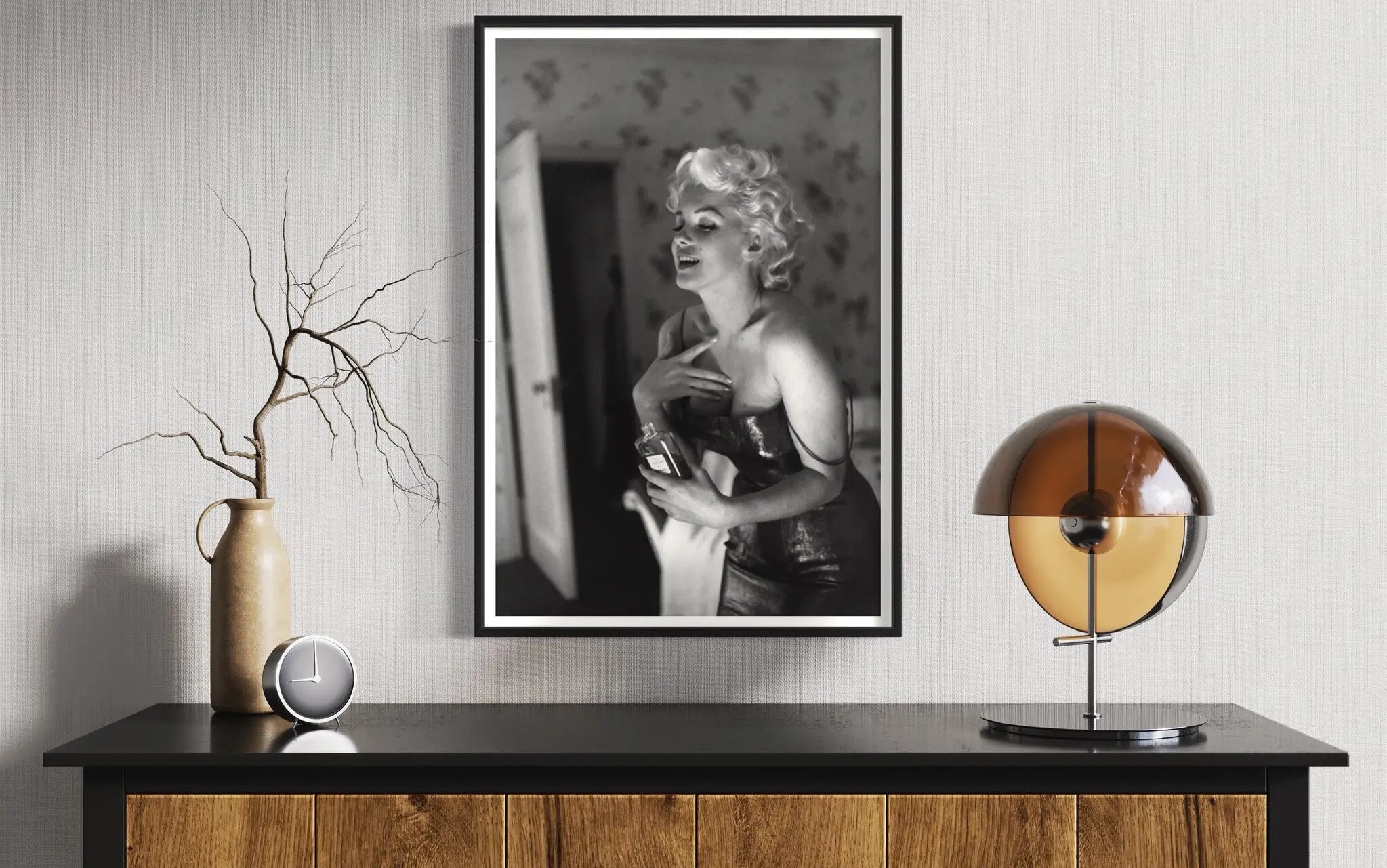Marilyn Monroe Getting Ready by Ed Feingersh displayed in a modern living room interior