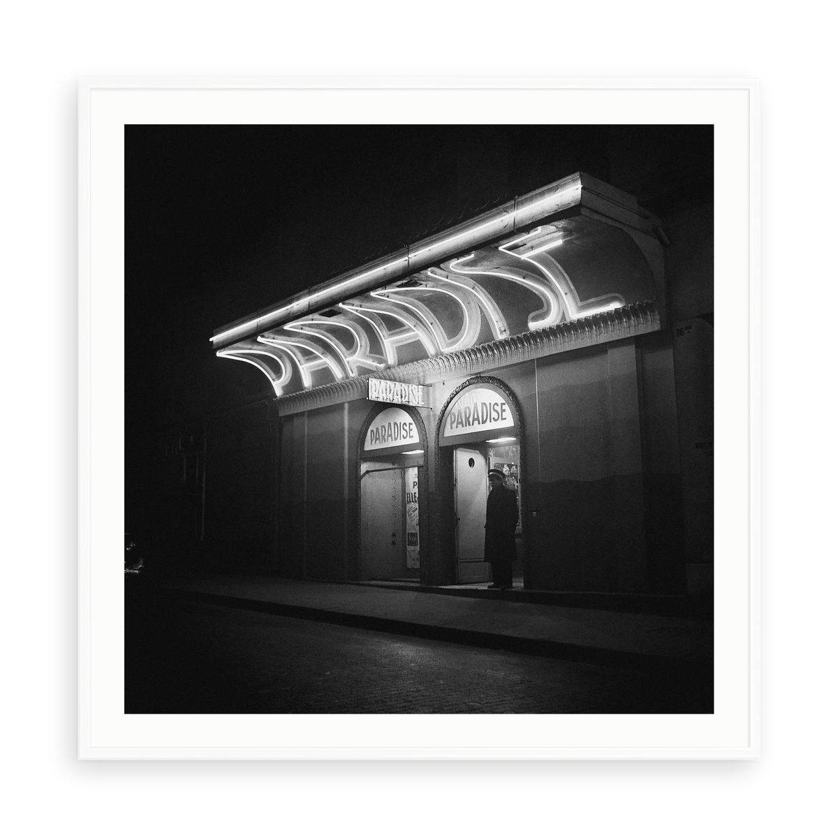 Paris At Night by Michael Ochs Archives — illustrative matte-white framed paper print with white mat; proportions vary by size.