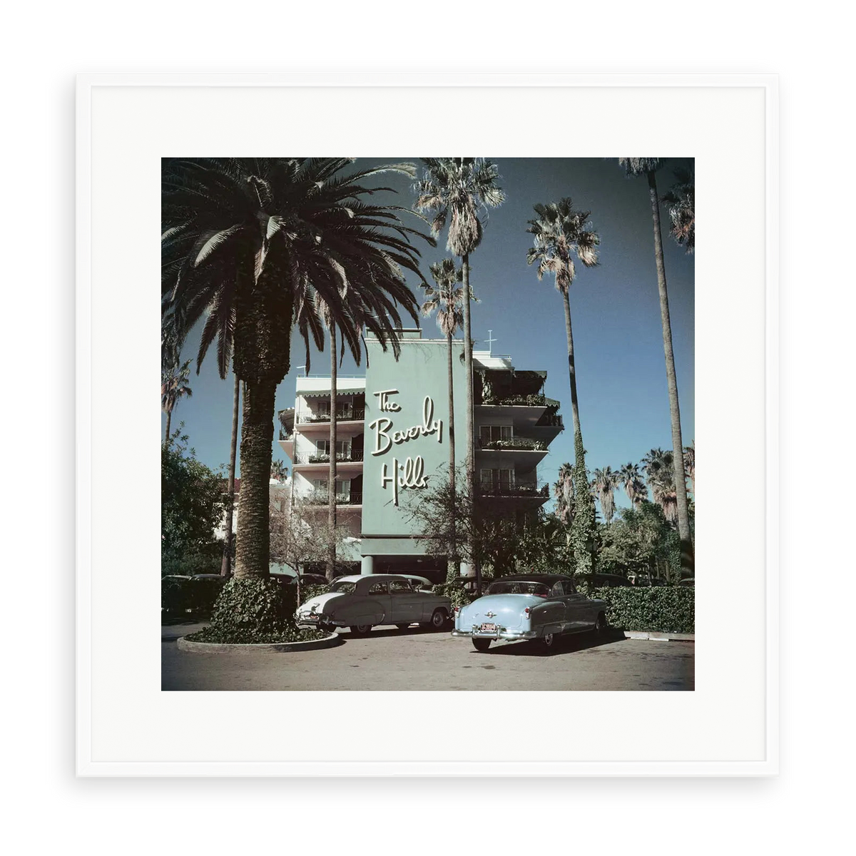 Illustrative matte-white framed preview with white inner border of Beverly Hills Hotel by Slim Aarons. Proportions vary by size.