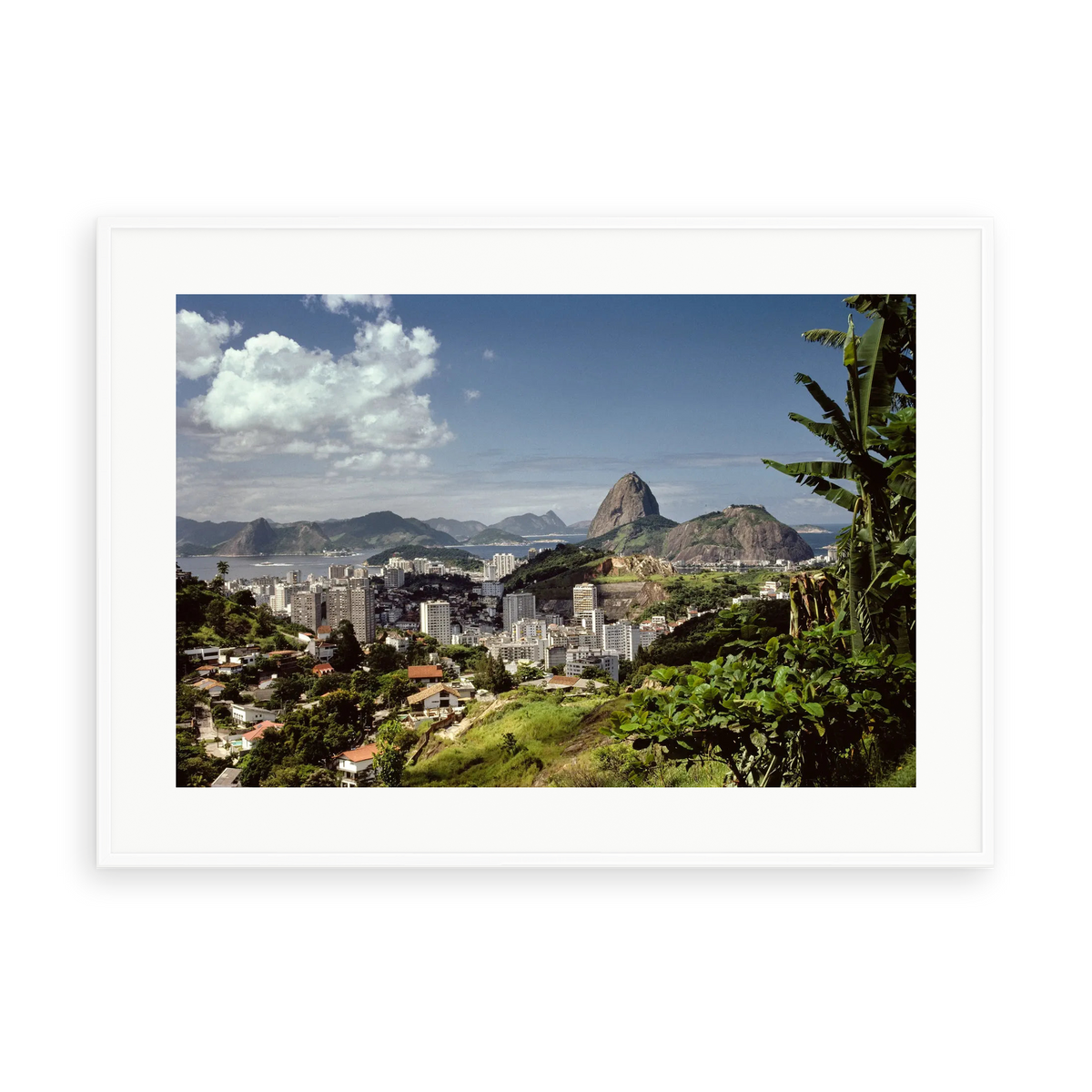 Illustrative matte-white framed preview with white inner border of Rio de Janeiro Brazil by Slim Aarons. Proportions vary by size.