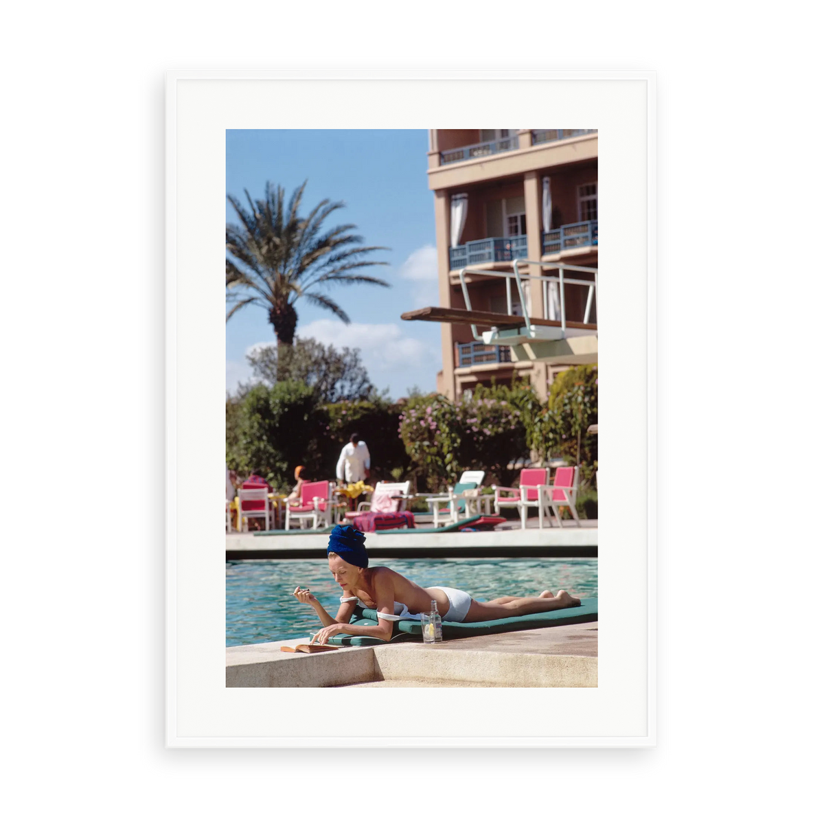 Illustrative matte-white framed preview with white inner border of Poolside In Marrakesh Morocco by Slim Aarons. Proportions vary by size.