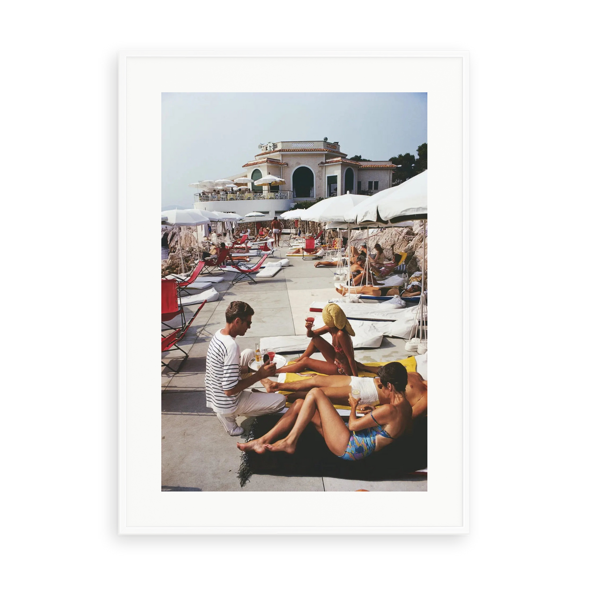 Illustrative matte-white framed preview with white inner border of Hotel Du Cap by Slim Aarons. Proportions vary by size.