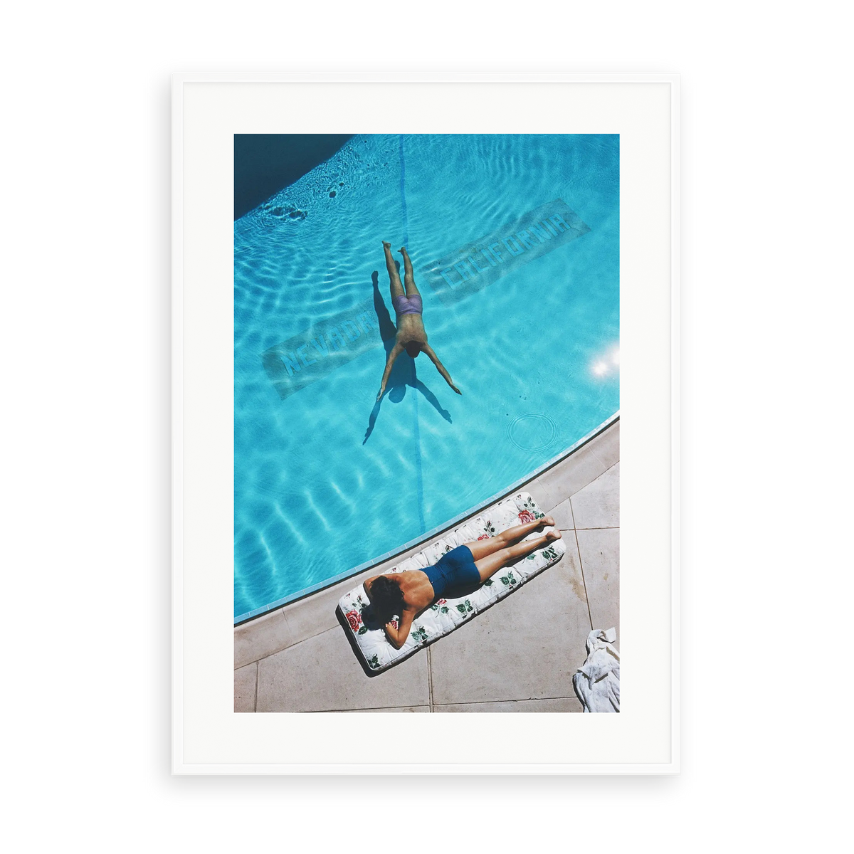 Illustrative matte-white framed preview with white inner border of Swimmer And Sunbather by Slim Aarons. Proportions vary by size.