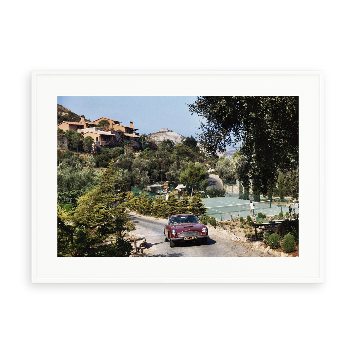 Illustrative matte-white framed preview with white inner border of Il Pellicano Tennis by Slim Aarons. Proportions vary by size.