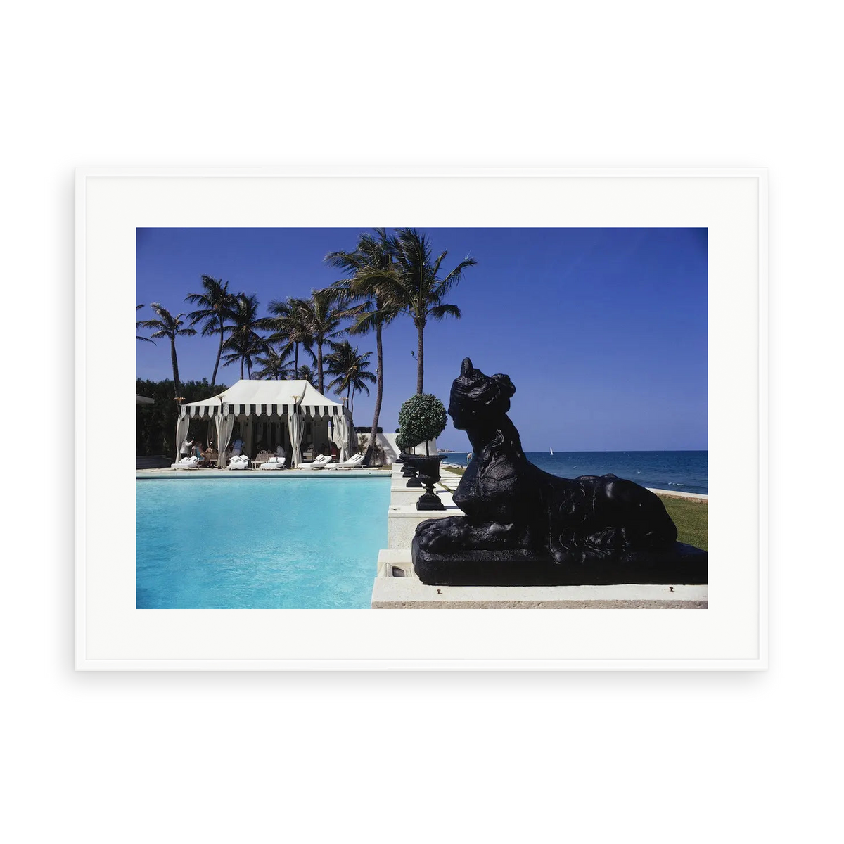 Illustrative matte-white framed preview with white inner border of Poolside Luncheon by Slim Aarons. Proportions vary by size.