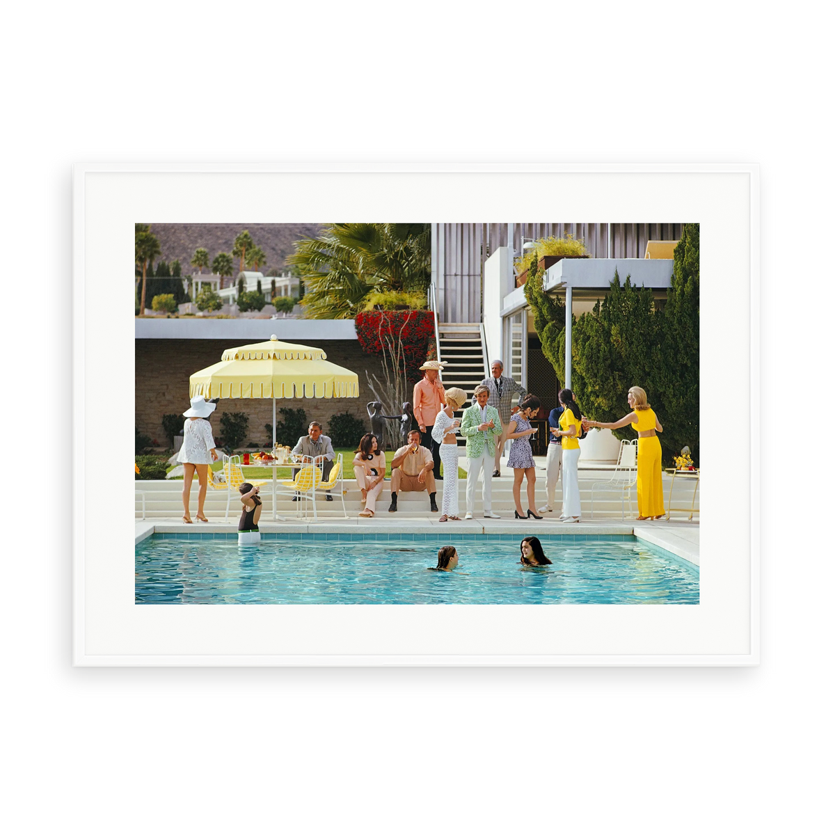 Illustrative matte-white framed preview with white inner border of Poolside Gathering by Slim Aarons. Proportions vary by size.