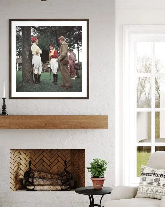 Race Meeting Kenya by Slim Aarons displayed in a modern living room interior