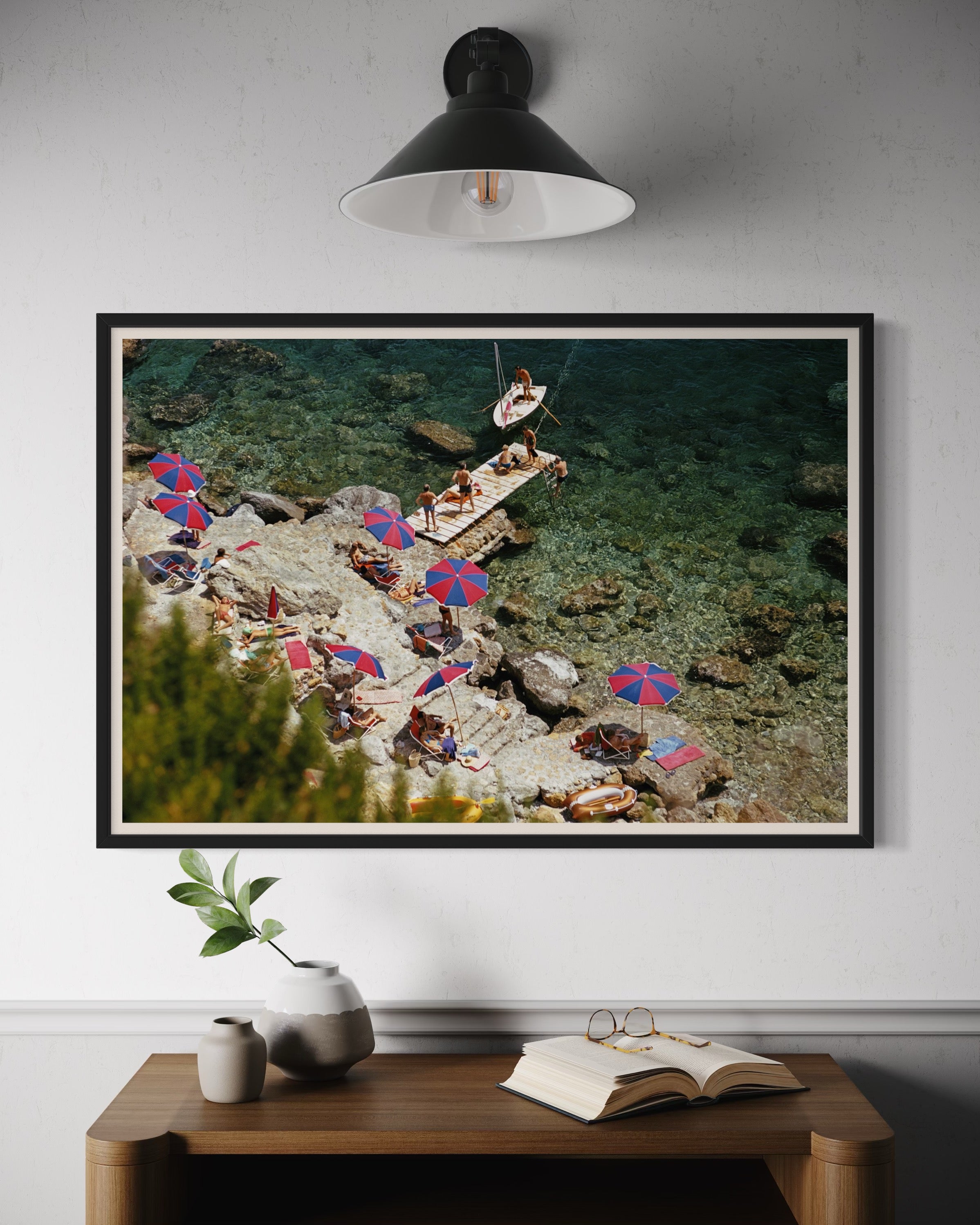 Slim Aarons’ Beach at Il Pellicano featured in a modern hallway gallery wall, ideal for real estate staging art and curated art collections for high-end properties.
