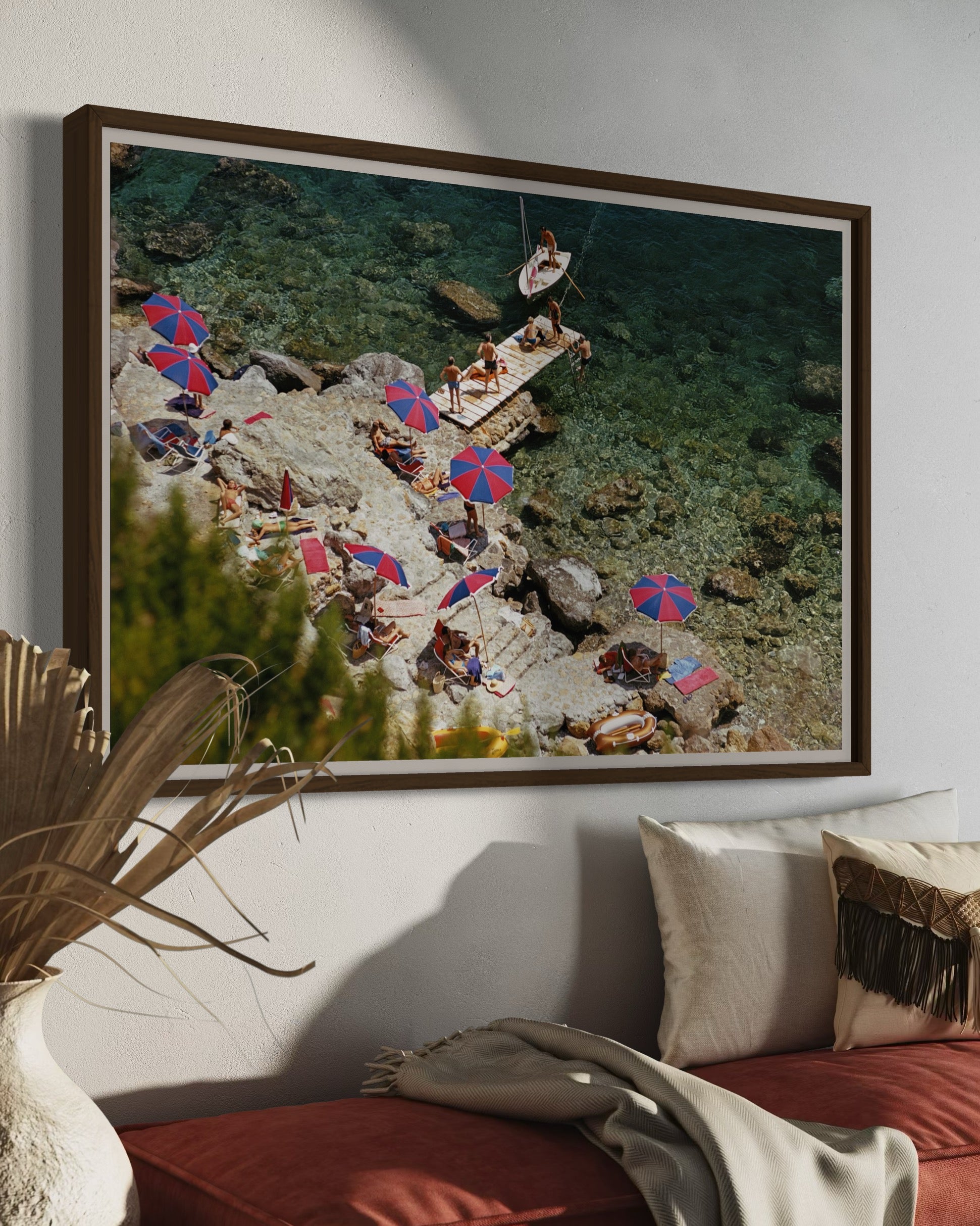 Slim Aarons’ Beach at Il Pellicano featured in a modern hallway gallery wall, ideal for real estate staging art and curated art collections for high-end properties.