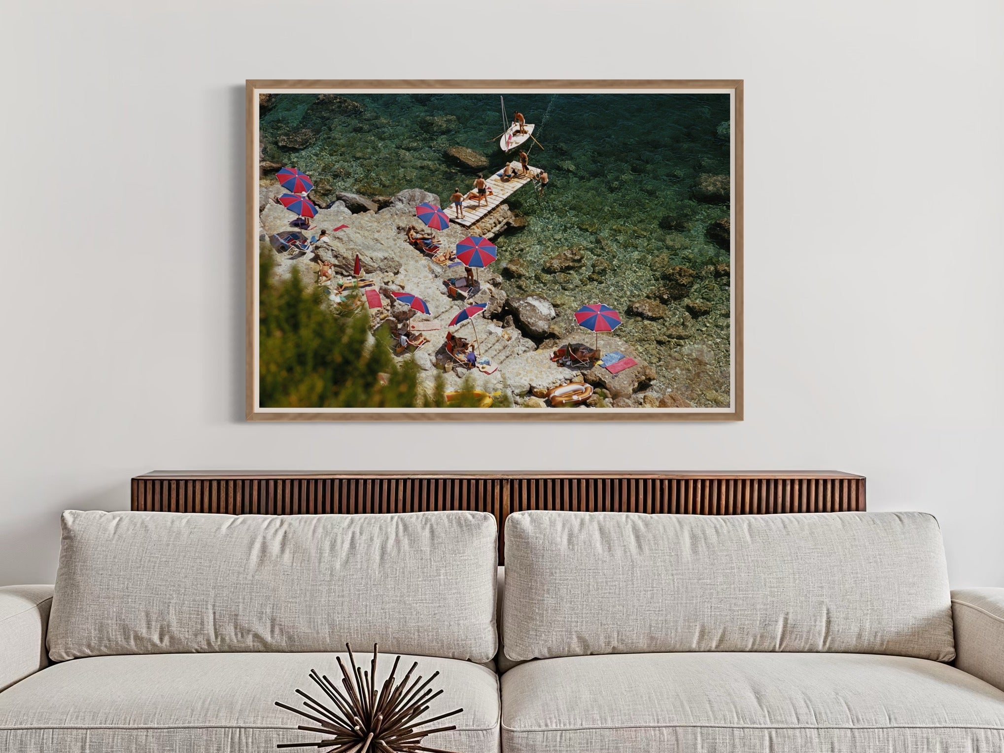 Slim Aarons’ Beach at Il Pellicano featured in a modern hallway gallery wall, ideal for real estate staging art and curated art collections for high-end properties.