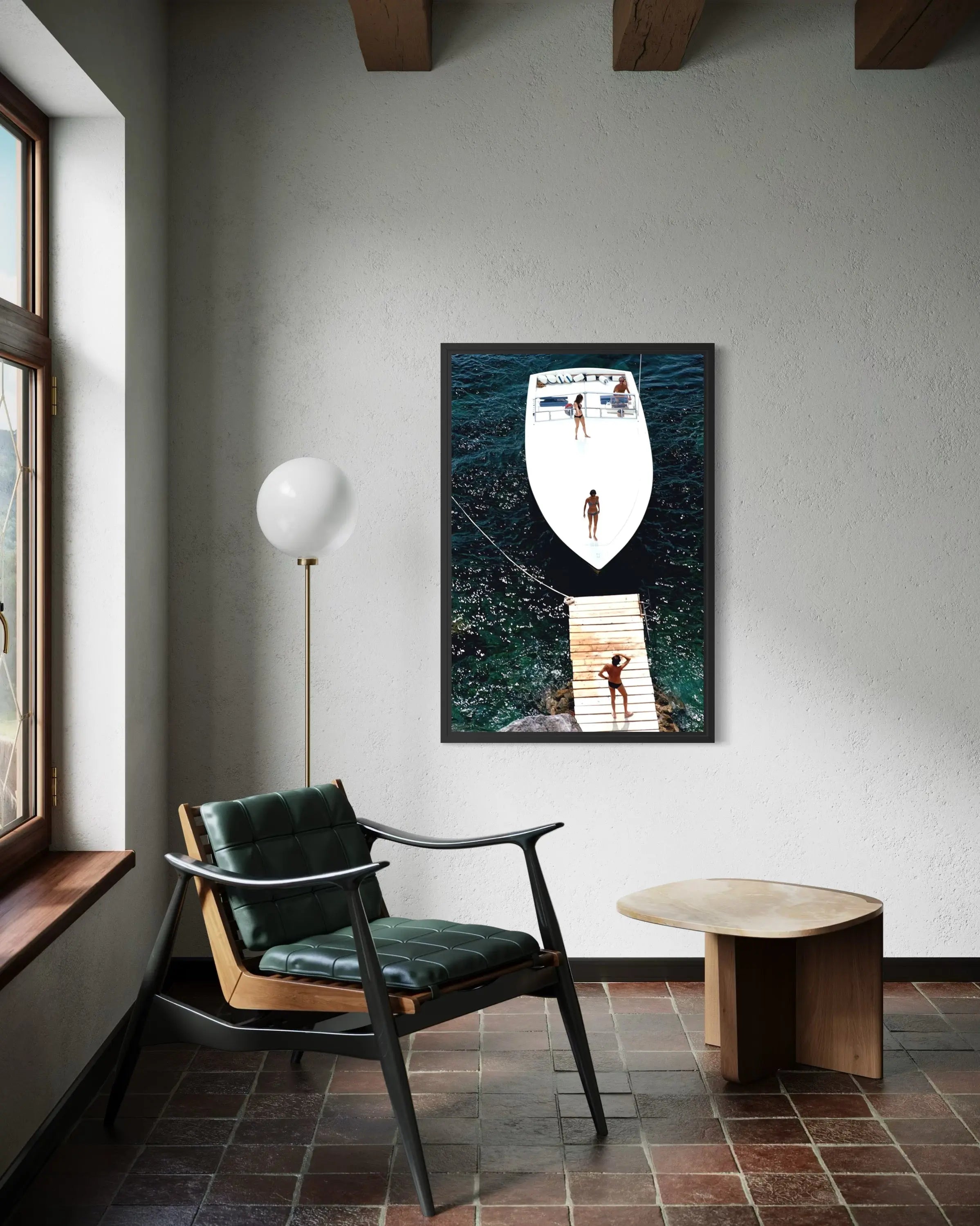 Speedboat Landing by Slim Aarons displayed in a modern living room interior