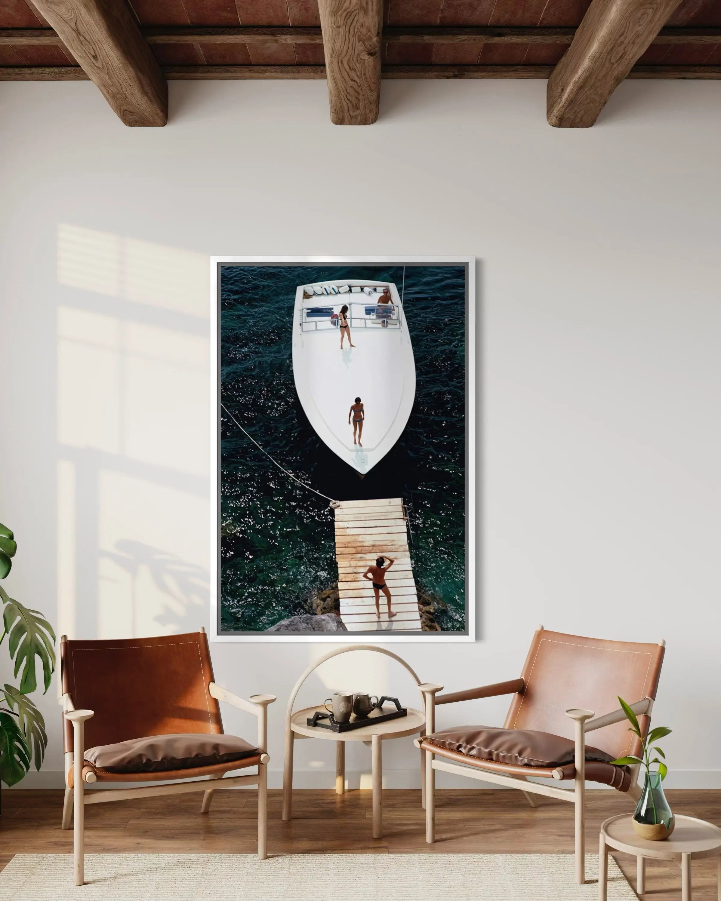Speedboat Landing by Slim Aarons showcased in a designer room setting