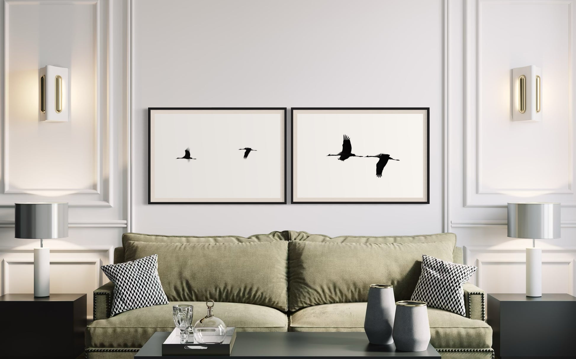 Living room with a green sofa, framed artwork of birds, and decorative items.