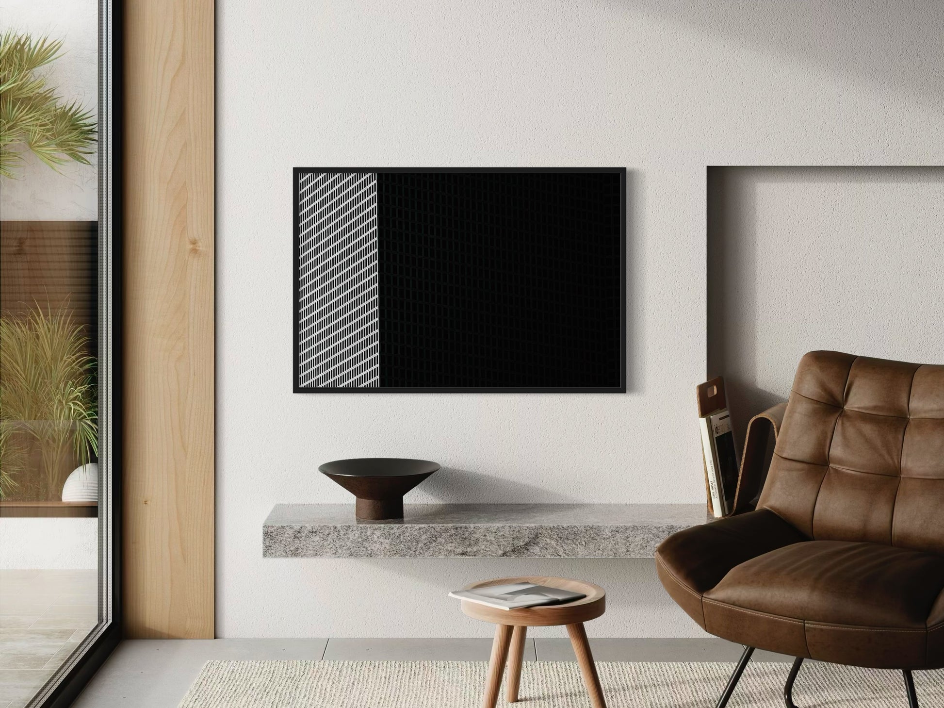 Modern living room with a brown leather chair, wooden side table, and abstract wall art.