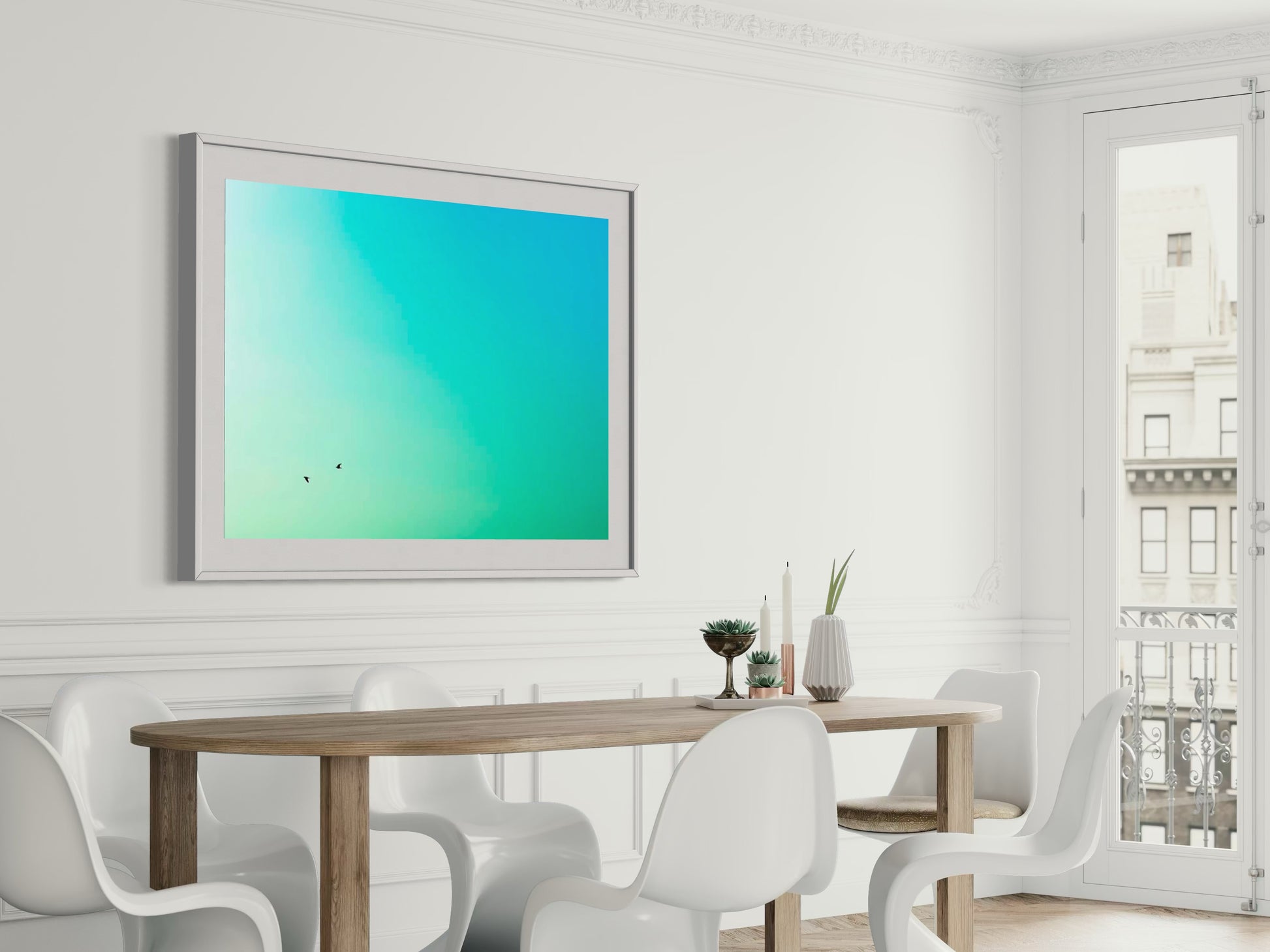 Modern dining room with a large framed artwork on the wall.