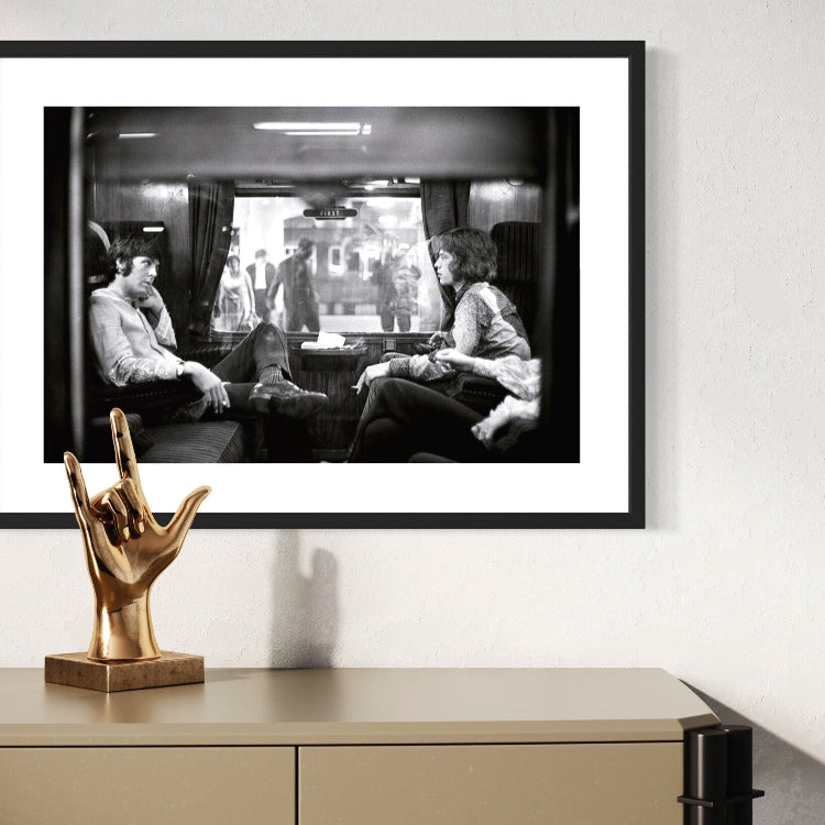 First Class Travel by Victor Blackman featured in a clean hallway gallery wall, ideal for real estate staging art and curated art collections.