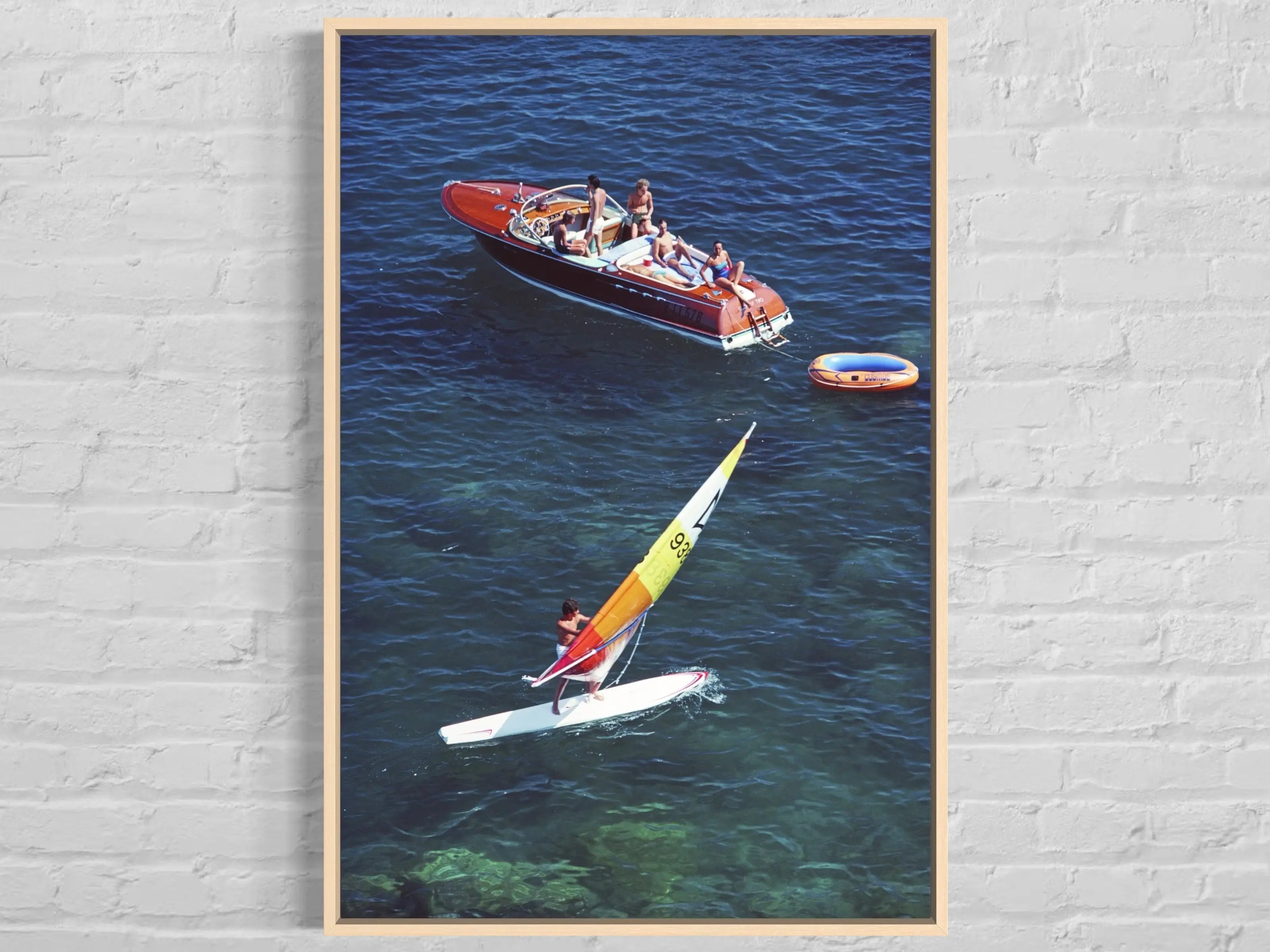 Windsurf in Porto Ercole by Slim Aarons displayed in a modern living room interior