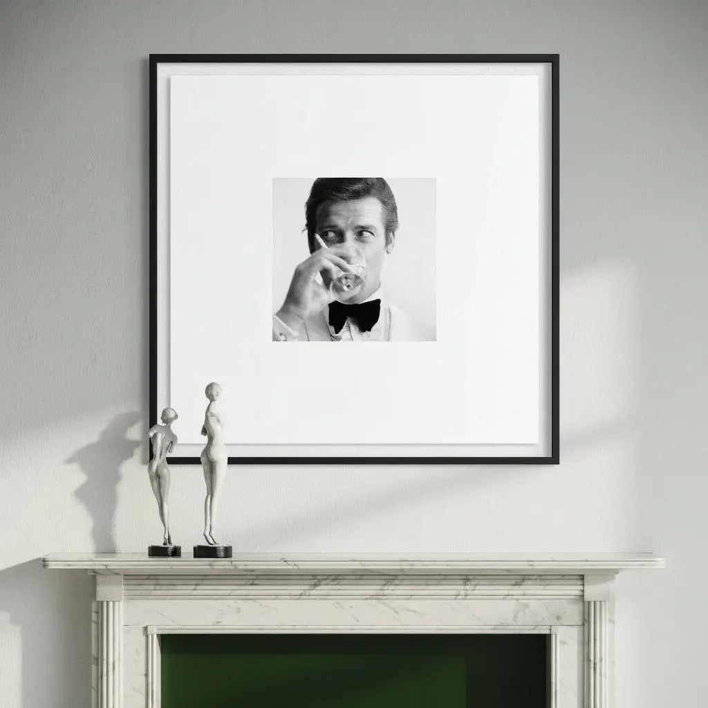 The Picturalist custom framed portrait of Roger Moore as James Bond 007 agent framed in black with an extra-wide mat