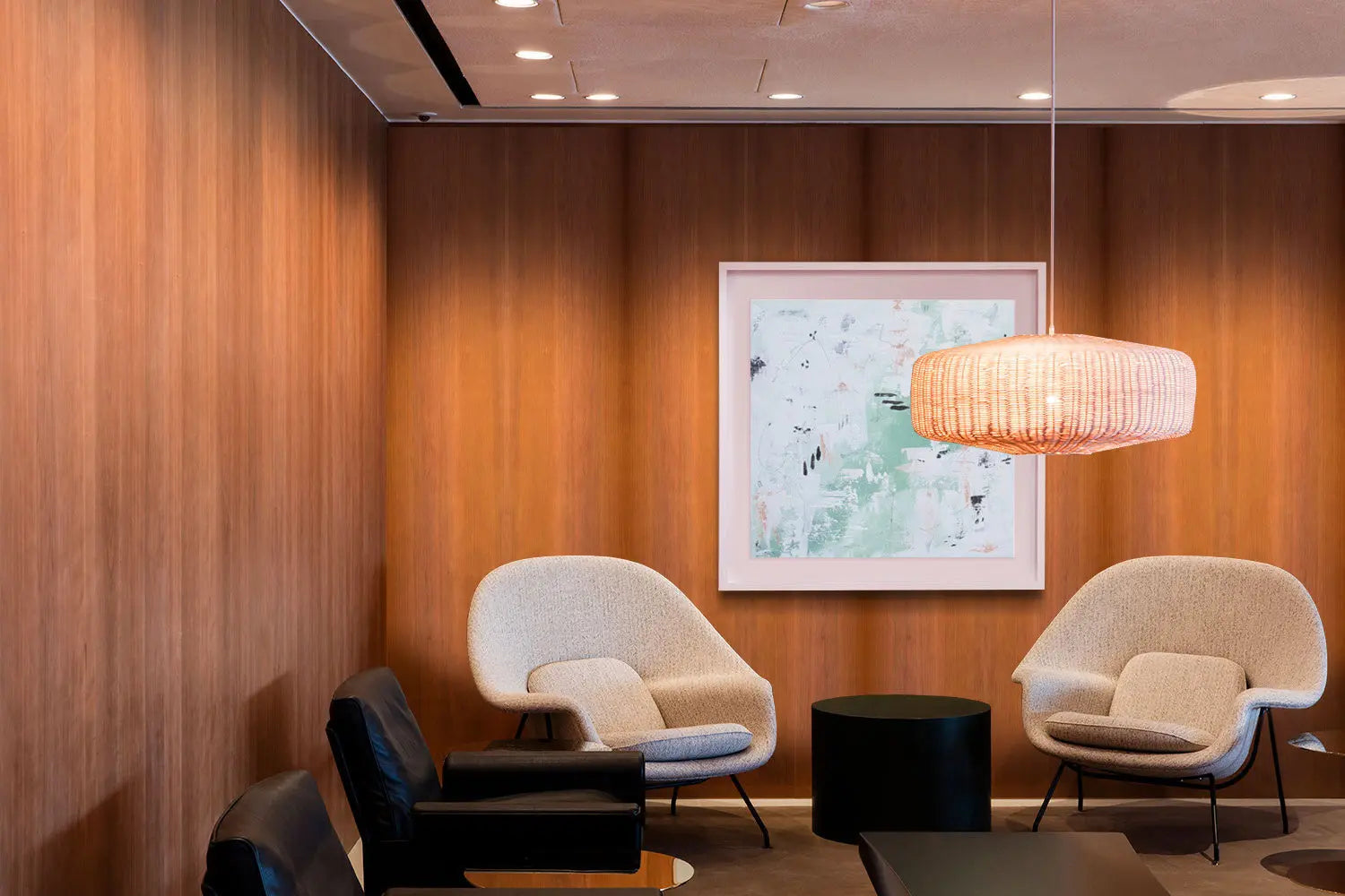 Vibrant abstract artwork by Chantelle Fulce displayed above a lamp in a living room, by The Picturalist