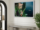 Slim Aarons’ Giacomo Montegazza featured in a modern hallway gallery wall, perfect for real estate staging art and curated art collections for high-end properties.