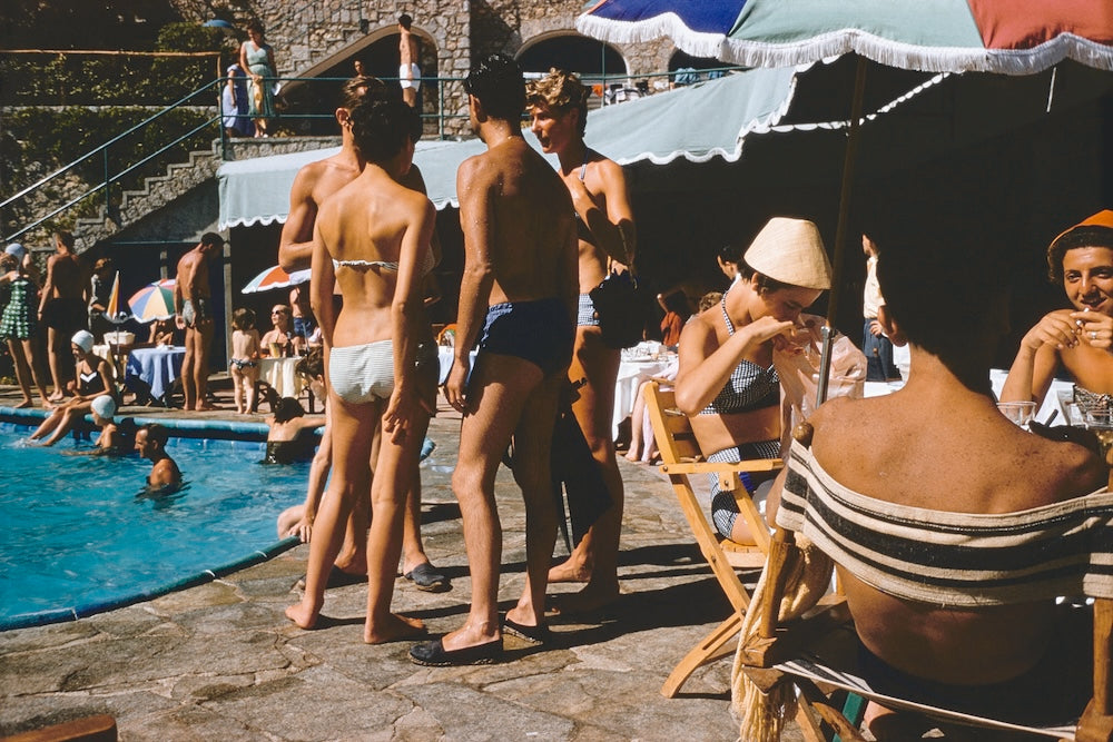 Bathers relax by the swimming pool at La Canzone del Mare at the Marina Piccola, Capri, Italy, 1954. (Photo by Slim Aarons/Hulton Archive/Getty Images