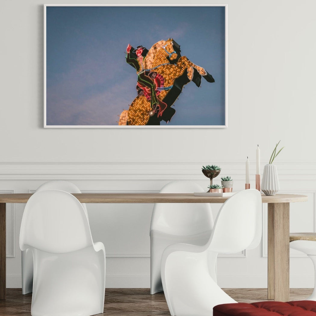 Luminous Cowboy Tale neon cowboy artwork featured in a hospitality setting, luxury wall art styled by The Picturalist.